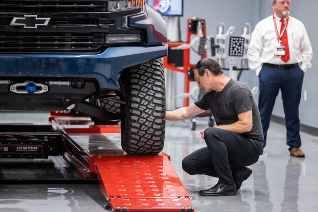 Joe kneeling and cleaning the Blacklake XT1.